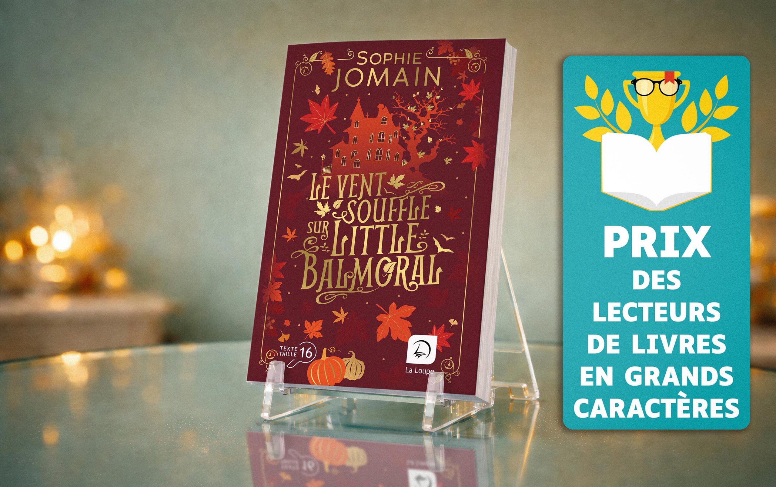 Visuel du Prix des lecteurs de livres en grands caractères présentant Le vent souffle sur Little Balmoral de Sophie Jomain, lauréat 2026, édité en grands caractères par Les éditions de La Loupe, en typographie Luciole corps 16.